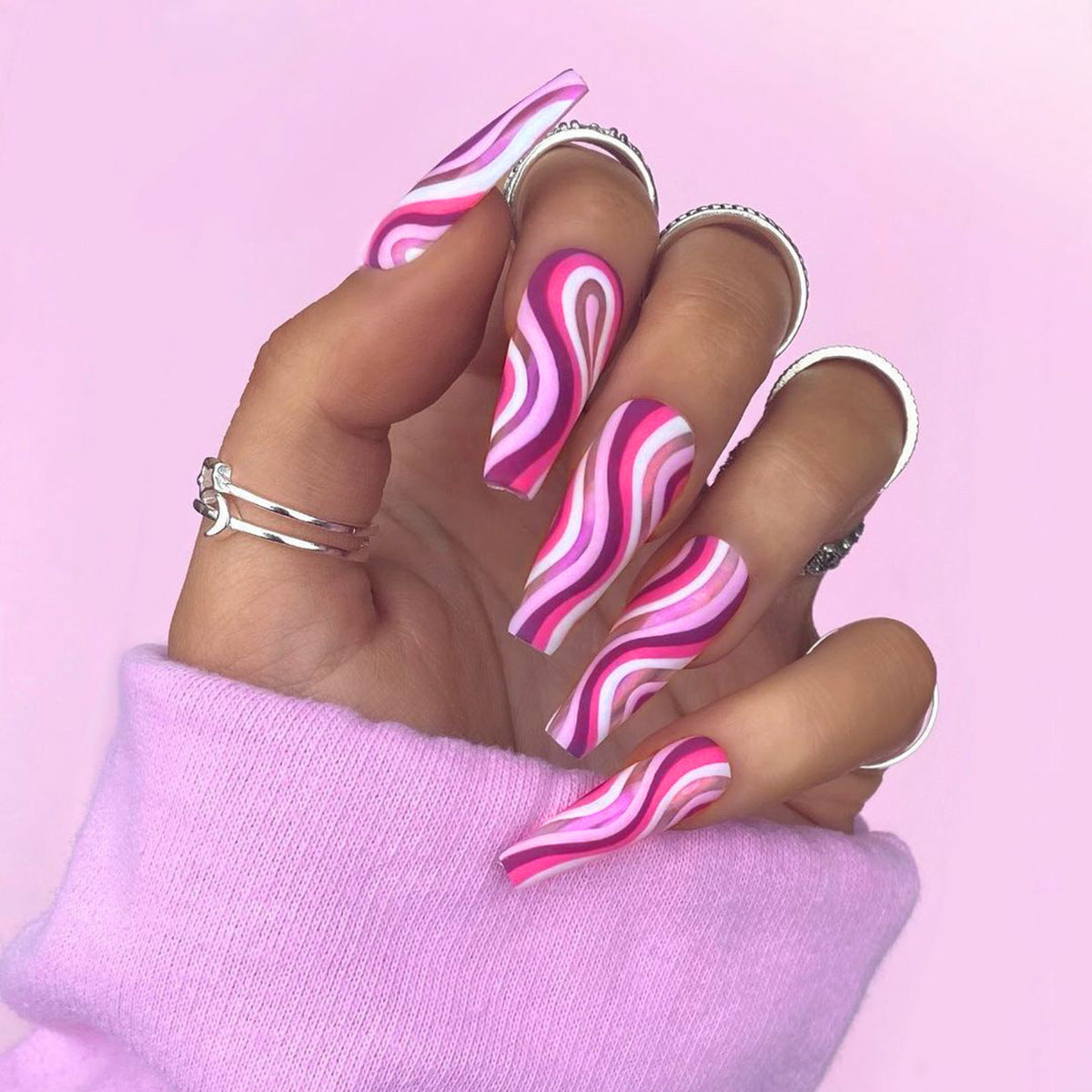 Detachable press-on false nails with finished artistic designs and application tips