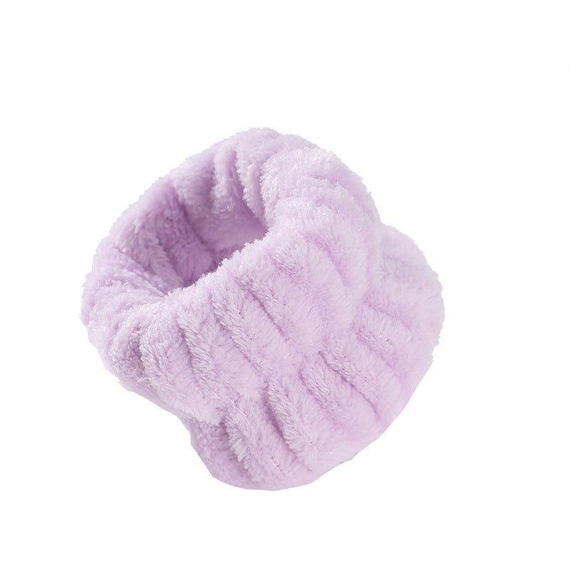 Single lilac microfiber wrist wash band that keeps water off your sleeves while you wash your face