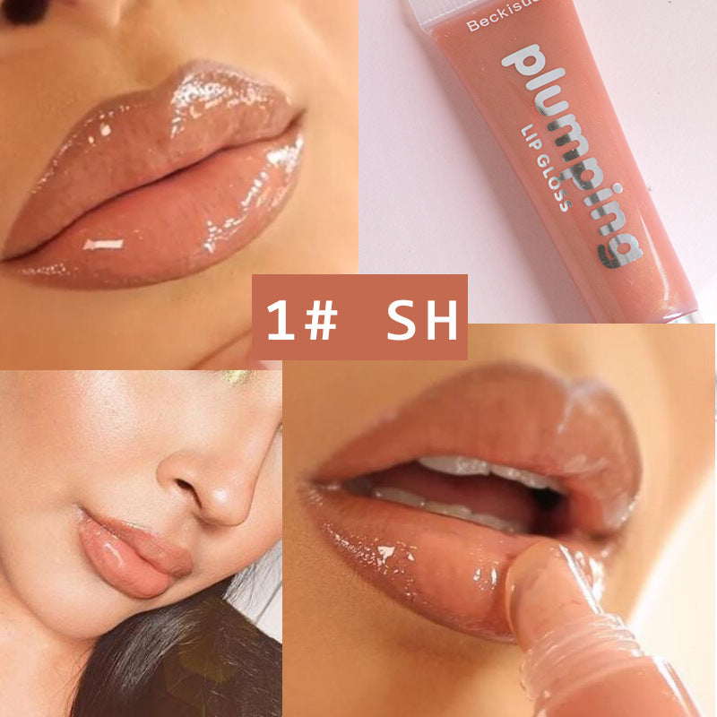 Wet Cherry plumping lip gloss with vitamin E for a high-shine, volumising finish