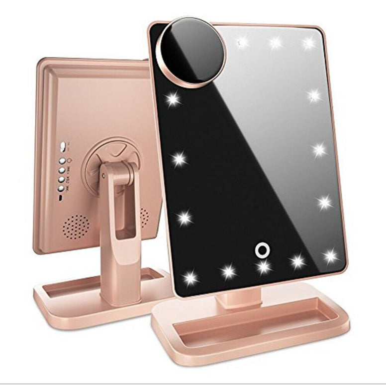 Touch-screen LED makeup mirror with a 20-bulb ring light, built-in Bluetooth speaker and 10x magnifying insert