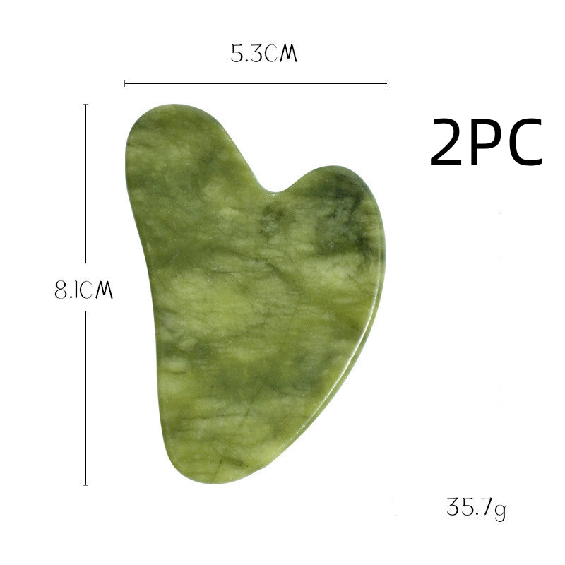 Two-piece jade gua sha stone set, each stone 8.1 cm by 5.3 cm and 35.7 g