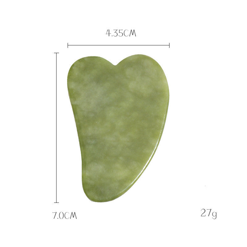 Compact jade gua sha stone, 7 cm by 4.35 cm and 27 g, sized for cheekbones and under the eye