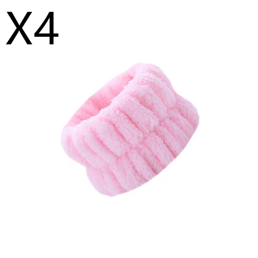 Four-pack of pink microfiber wrist wash bands for face washing and skincare routines